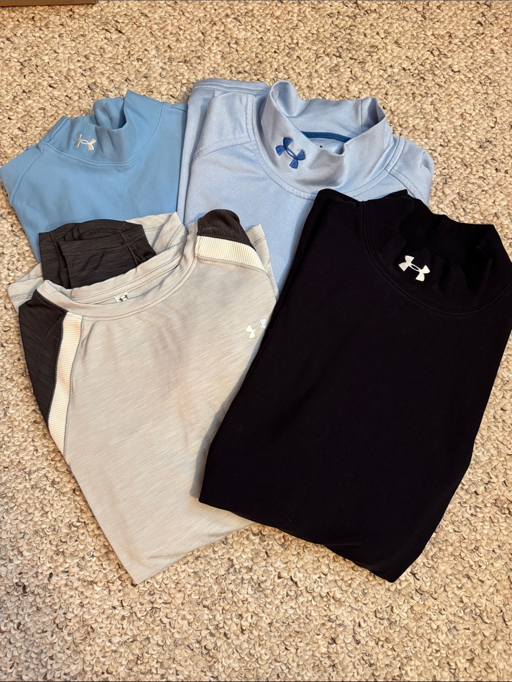 4 women’s UA tops
